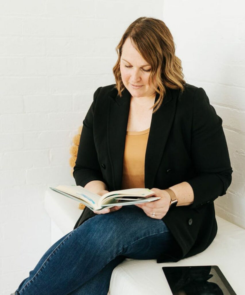 lorissa sitting and reading book