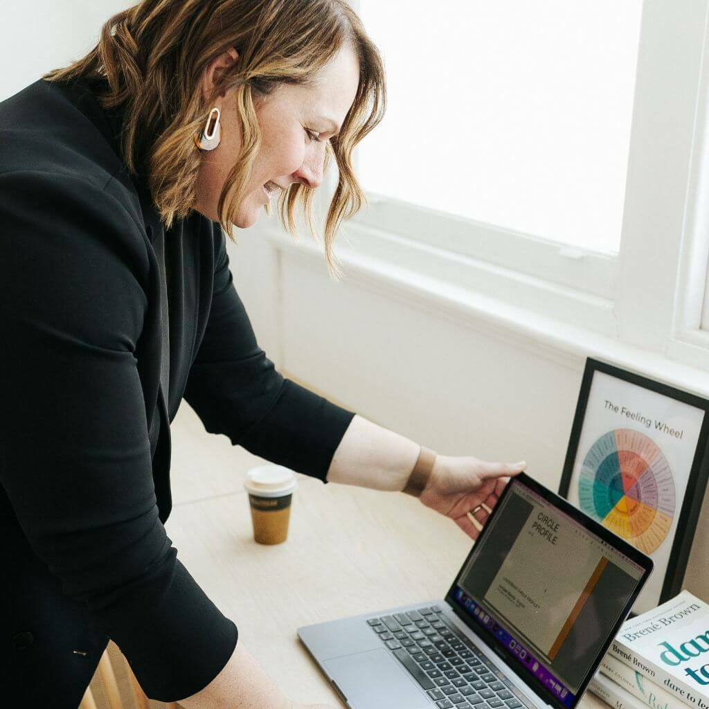 Lorissa Garcia looking at a document on a computer